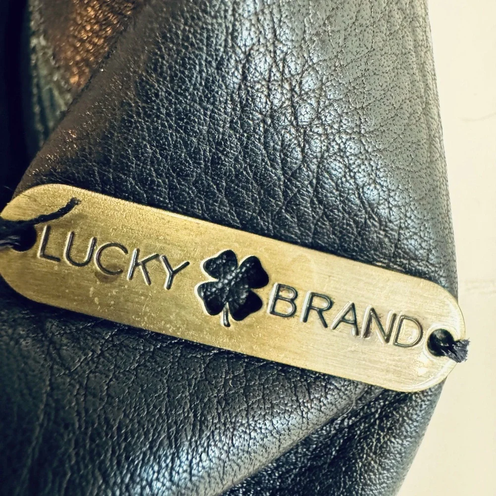 Lucky Brand Abbey fold over black leather studded messenger bag.Very Clean.